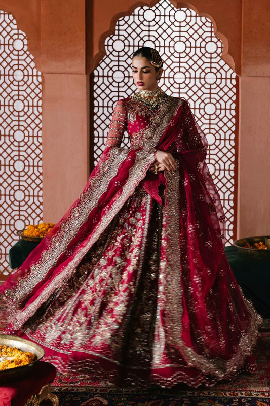 Graceful organza suit with embellished front panels, blouse, sleeves, dupatta & inner—crafted with fine embroidery for timeless elegance and charm.