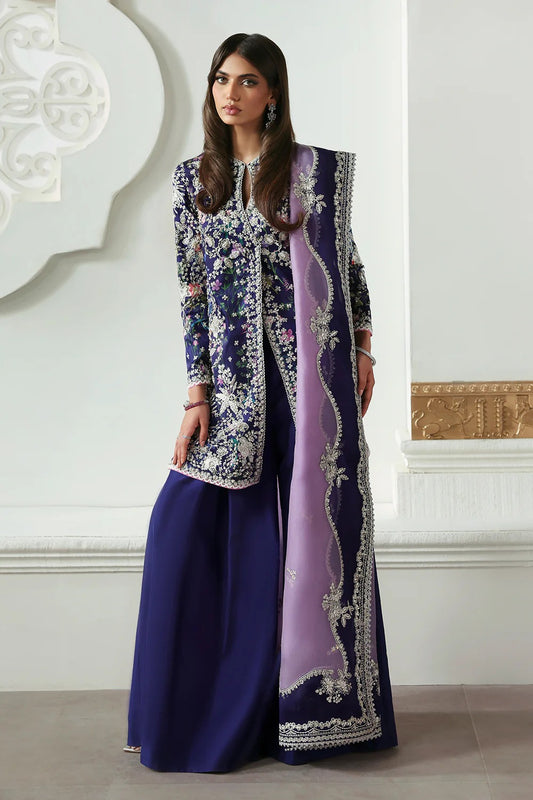 Elegant floral printed purple silk suit with embroidered panels, embellished organza dupatta, and matching silk trousers. A perfect outfit for festive & formal occasions.