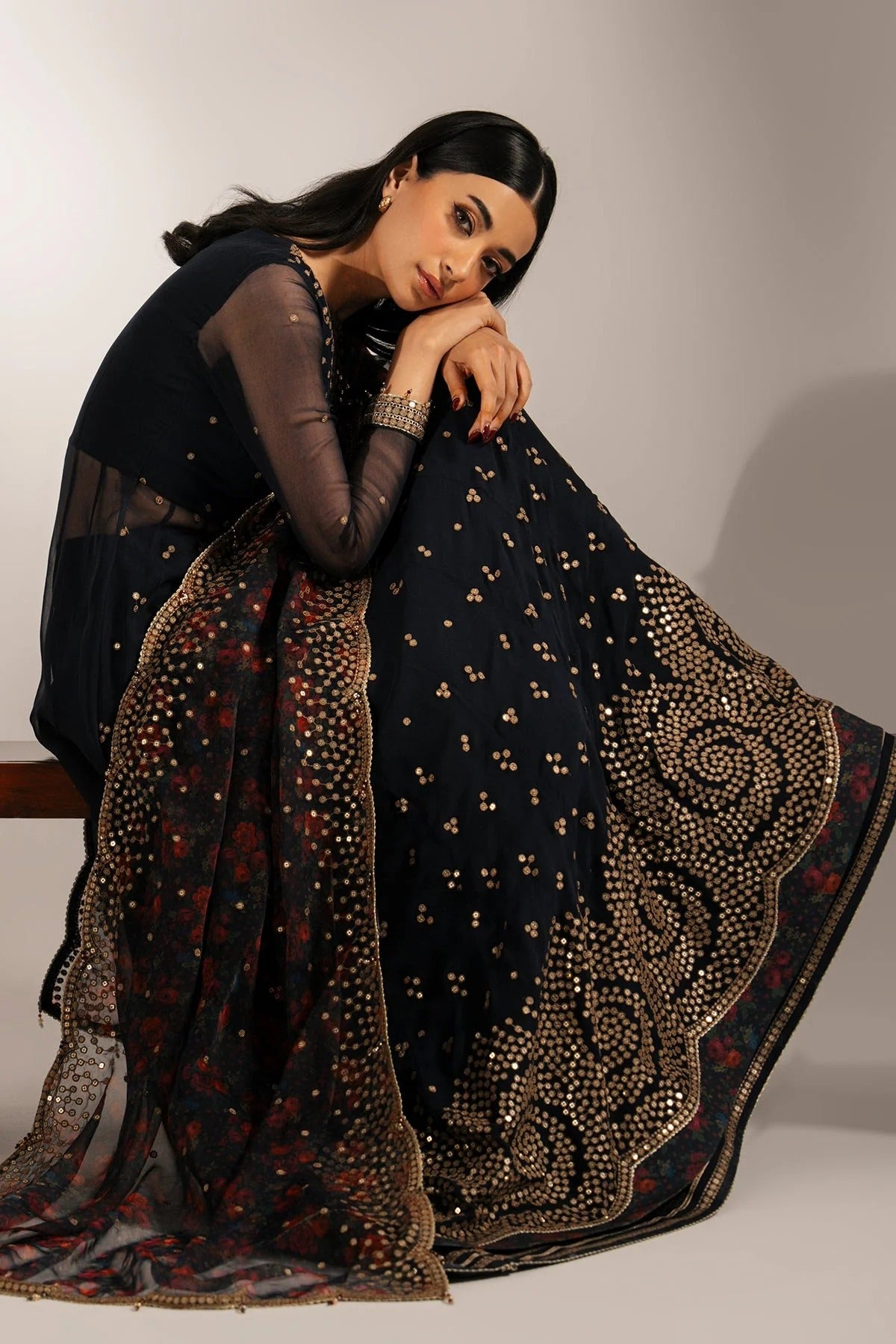 Intricately embroidered chiffon with digital print dupatta & rawsilk bottom—perfect for formal occasions. A luxurious look in every detail. Shop UC-3073 now!