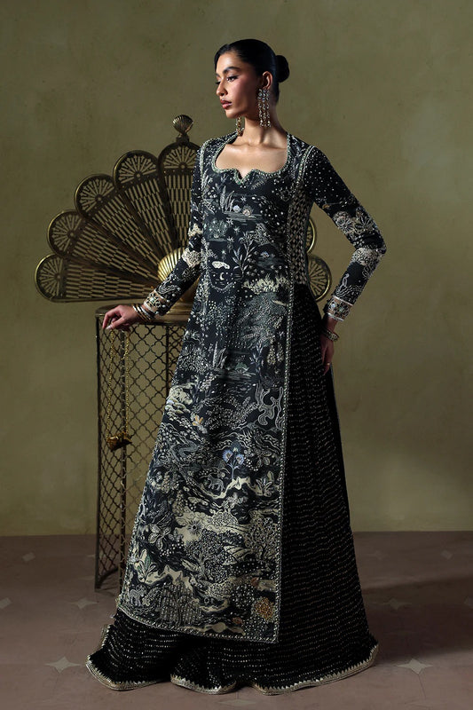 Stylish black silk suit featuring hand-embellished panels, embroidered dupatta, and chiffon crushed trousers. Perfect choice for festive and formal occasions.