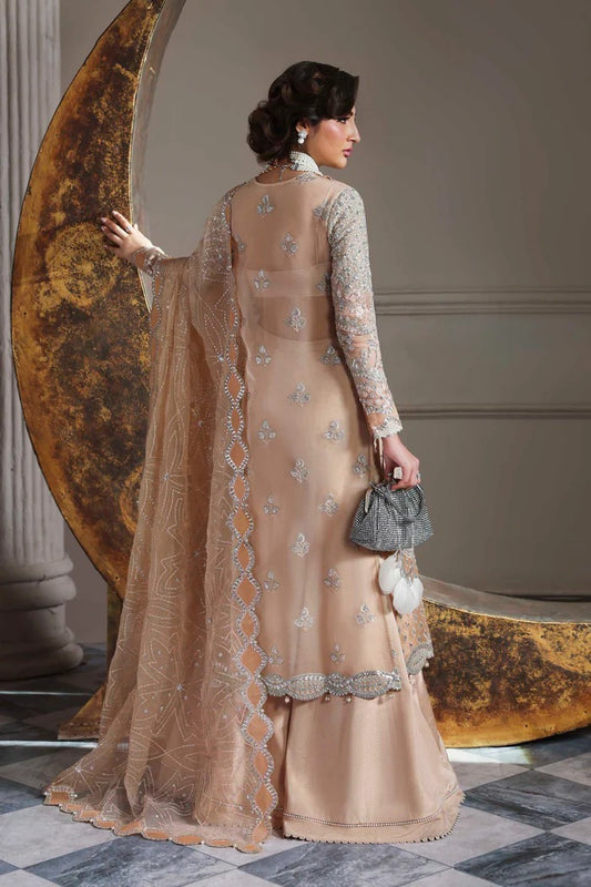 Elegant organza suit featuring embroidered front, back, sleeves, dupatta & trouser with borders, paired with silk inner—crafted for timeless grace.