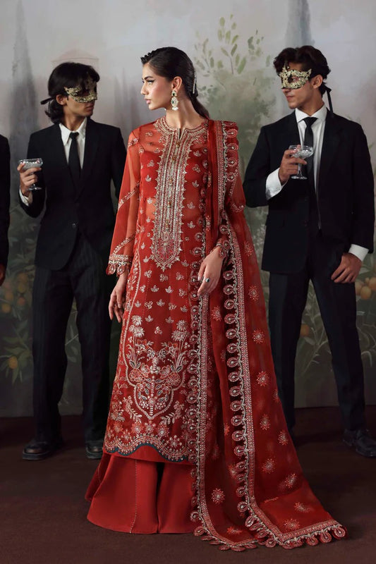 Stylish organza suit with embroidered front, neckline, back, sleeves & dupatta, paired with silk inner and trouser—crafted for elegance and grace.