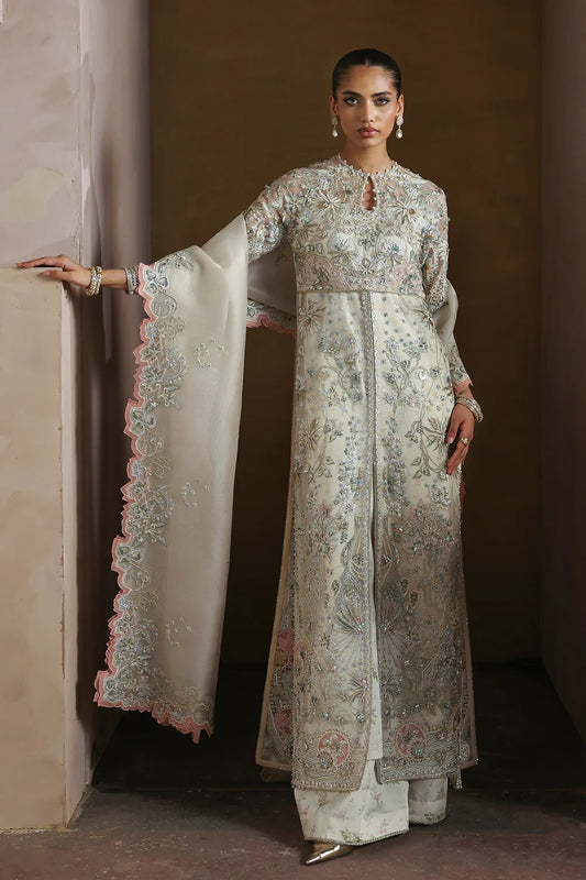 Elegant Opal White suit with embroidered organza panels, hand embellishments, silk trouser, and organza dupatta with delicate motifs.