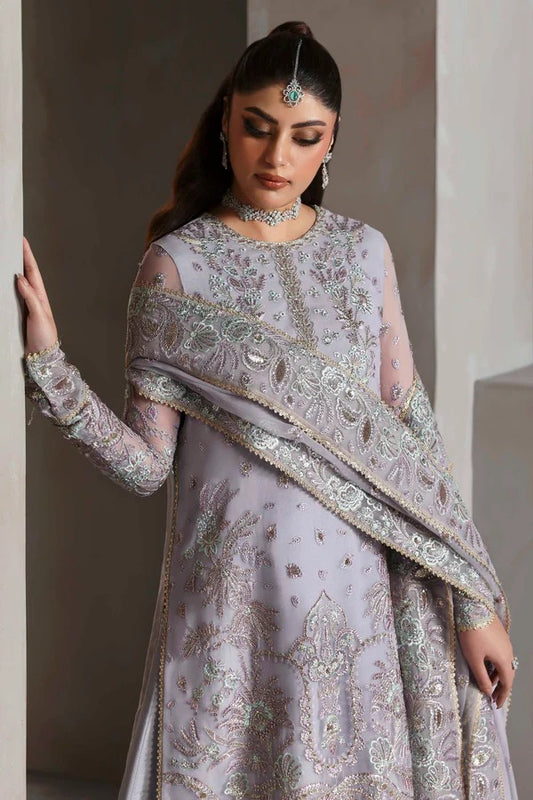 Graceful chiffon outfit with embroidered front, back, and sleeves enhanced by organza borders. Paired with a chiffon dupatta and raw silk trouser for elegance.