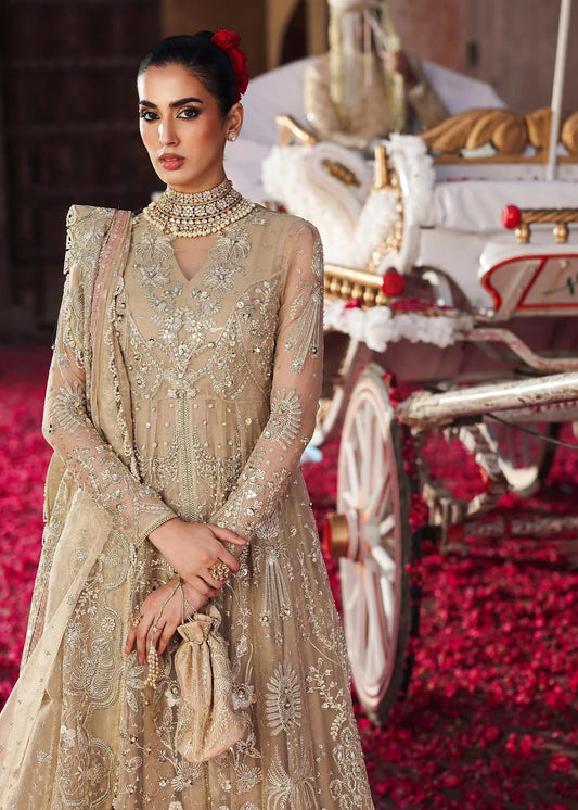 Elegant skin-golden formal outfit featuring hand-embroidered organza shirt, embellished dupatta with 4-side border, and raw silk trouser for a timeless look.