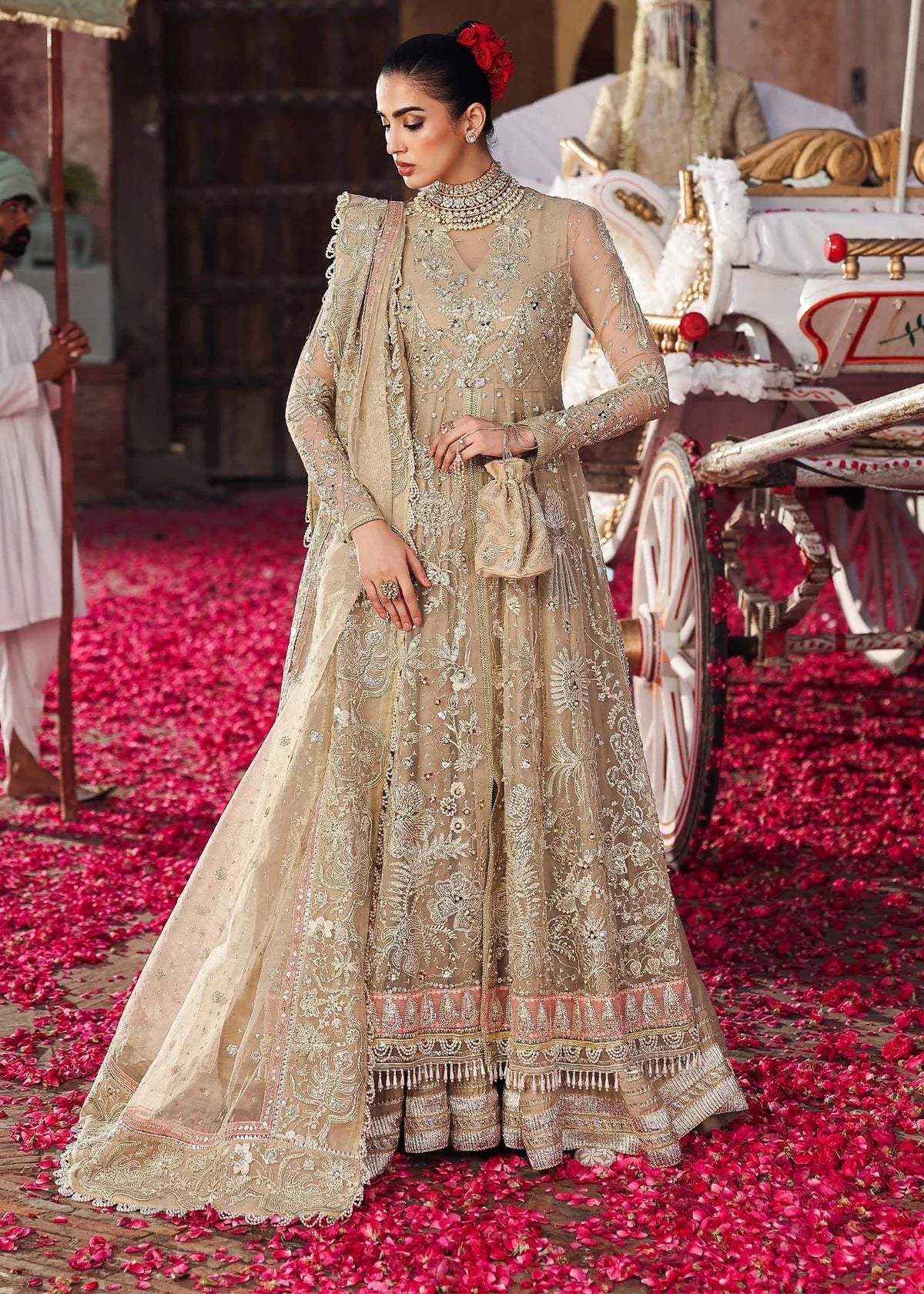 Elegant skin-golden formal outfit featuring hand-embroidered organza shirt, embellished dupatta with 4-side border, and raw silk trouser for a timeless look.