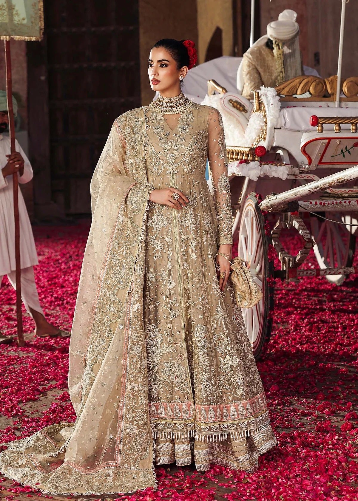 Elegant skin-golden formal outfit featuring hand-embroidered organza shirt, embellished dupatta with 4-side border, and raw silk trouser for a timeless look.