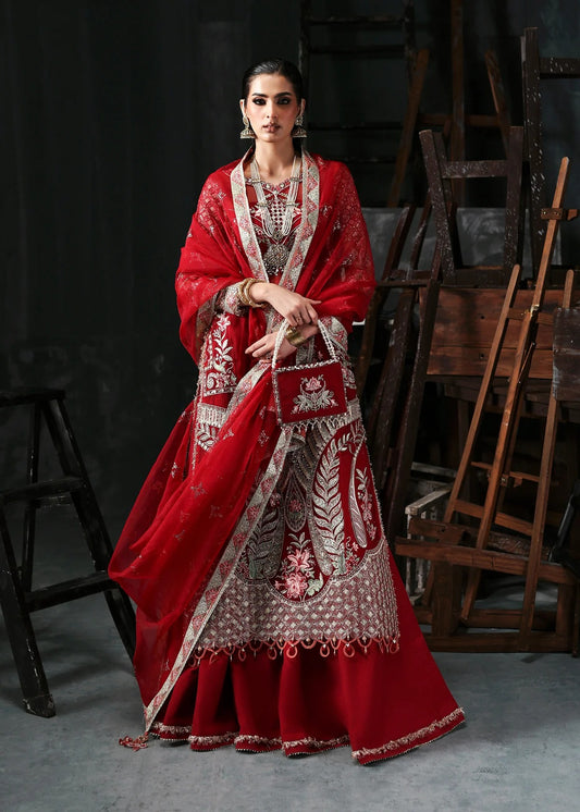 Stunning red organza dress with cutwork neckline, embroidered panels, dupatta & raw silk trouser. Available stitched/unstitch with custom sizing.