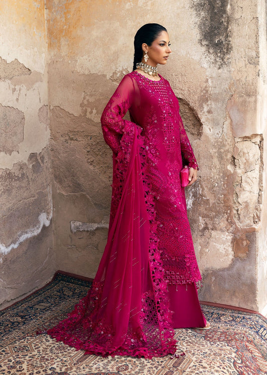Elegant chiffon suit with hand-embellished neckline, cutwork borders, diamante dupatta with organza motifs, and raw silk trouser — ideal for festive wear.