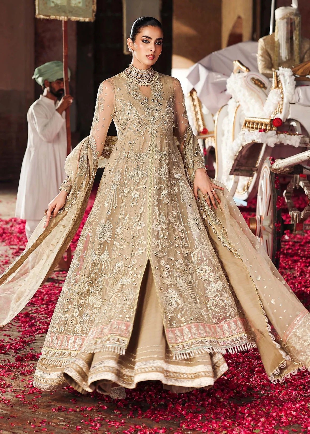 Elegant skin-golden formal outfit featuring hand-embroidered organza shirt, embellished dupatta with 4-side border, and raw silk trouser for a timeless look.