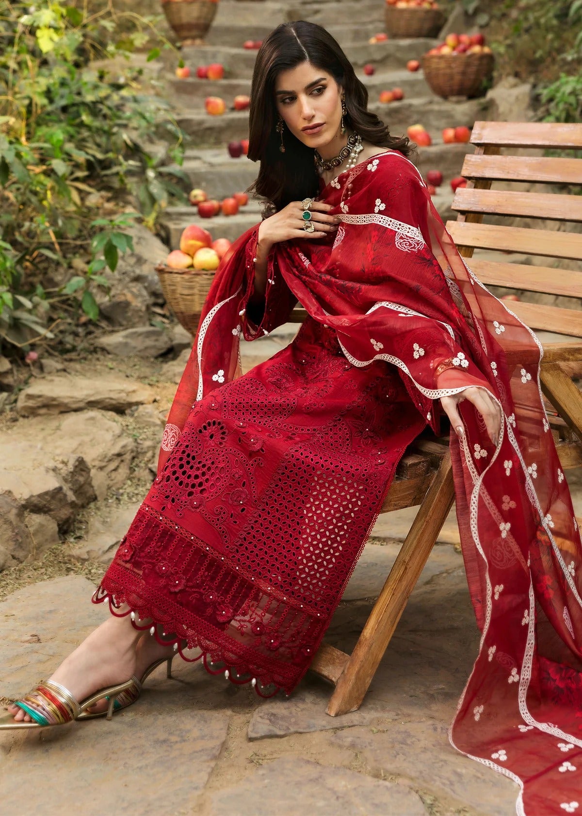 Stun in this maroon embroidered lawn suit with hand-work neckline, chikan-kari panels, 3D flowers, monar dupatta, and cotton trouser.