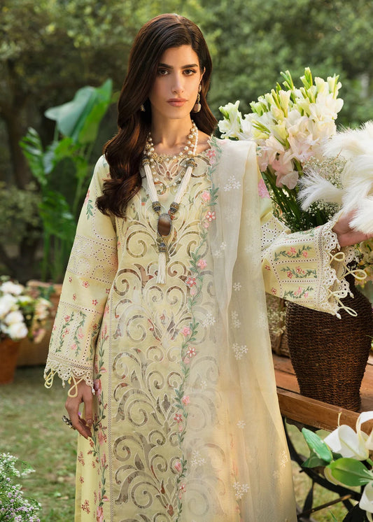 Shop this yellow embroidered lawn suit with chikan-kari sleeves, organza borders, woven net dupatta, and cotton trouser for an elegant summer look.