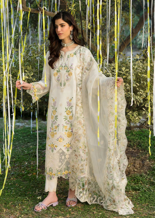 Look elegant in this ivory embroidered lawn suit with chikan-kari panels, hand-work neckline, woven net dupatta, and cotton trouser for a timeless style.