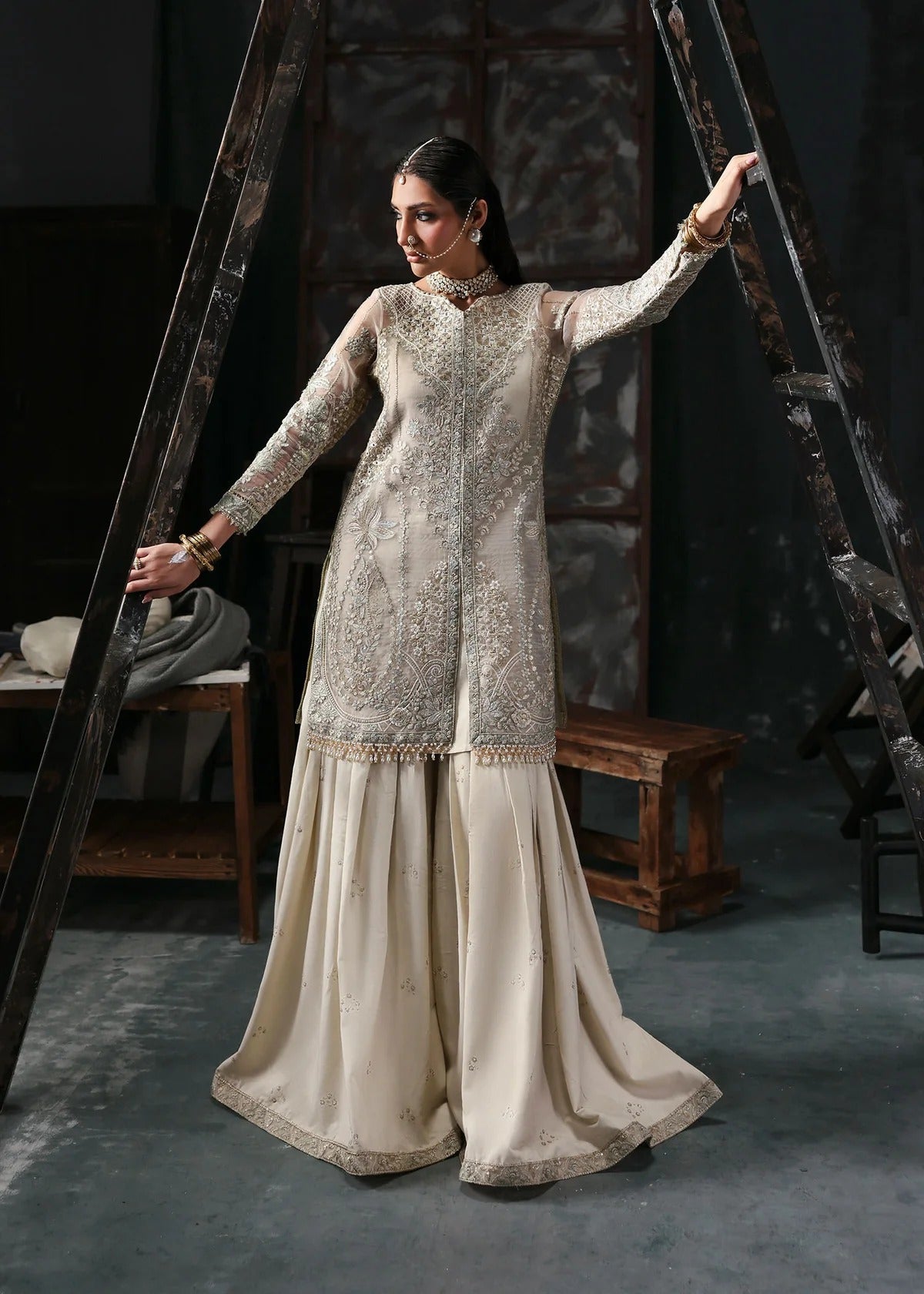 Elegant dusty white organza dress with embroidered panels, dupatta & raw silk trouser. Available stitched/unstitch with fast local & international delivery.