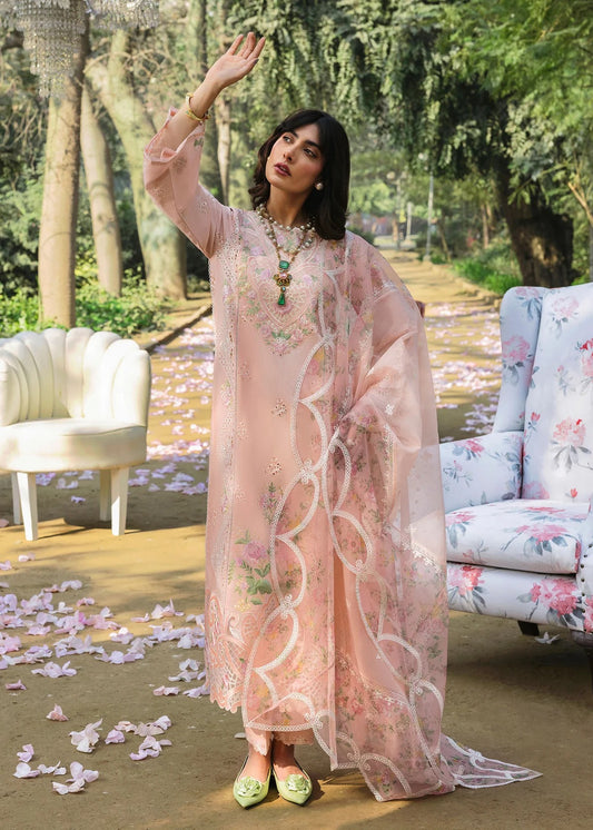 Grace your look with this peach embroidered lawn suit featuring chikan-kari panels, hand-work neckline, net dupatta, and cotton trouser.