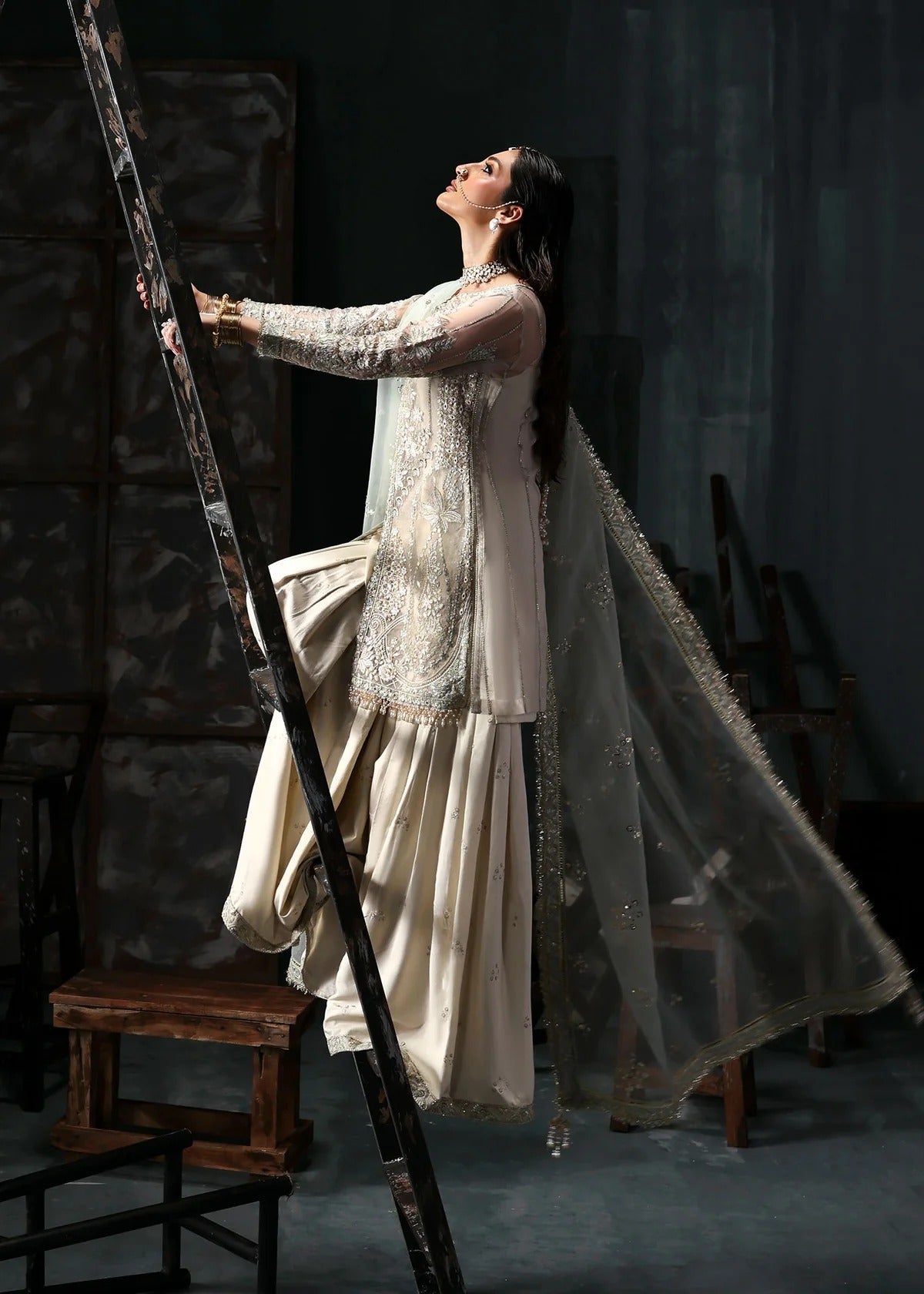 Elegant dusty white organza dress with embroidered panels, dupatta & raw silk trouser. Available stitched/unstitch with fast local & international delivery.