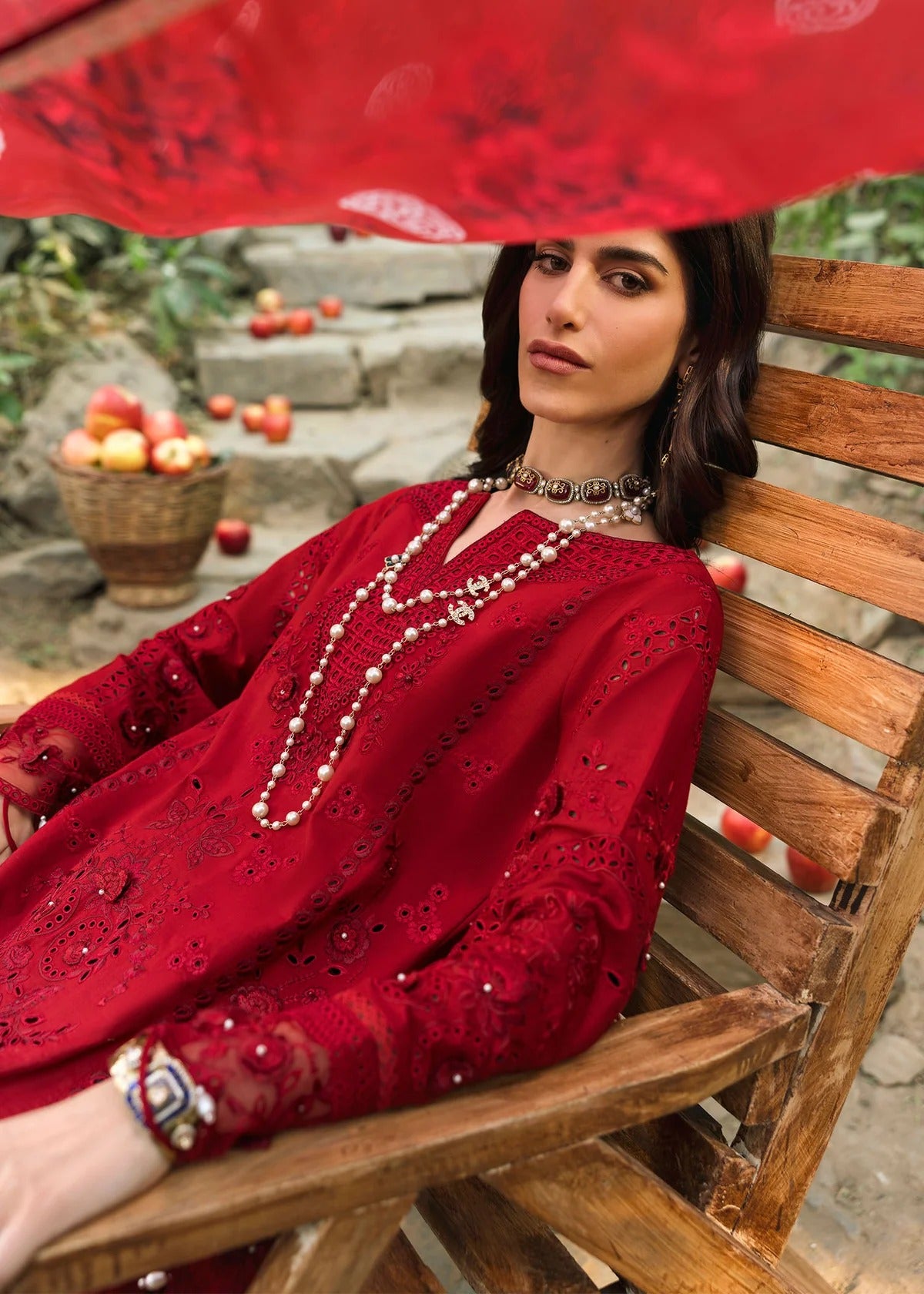 Stun in this maroon embroidered lawn suit with hand-work neckline, chikan-kari panels, 3D flowers, monar dupatta, and cotton trouser.