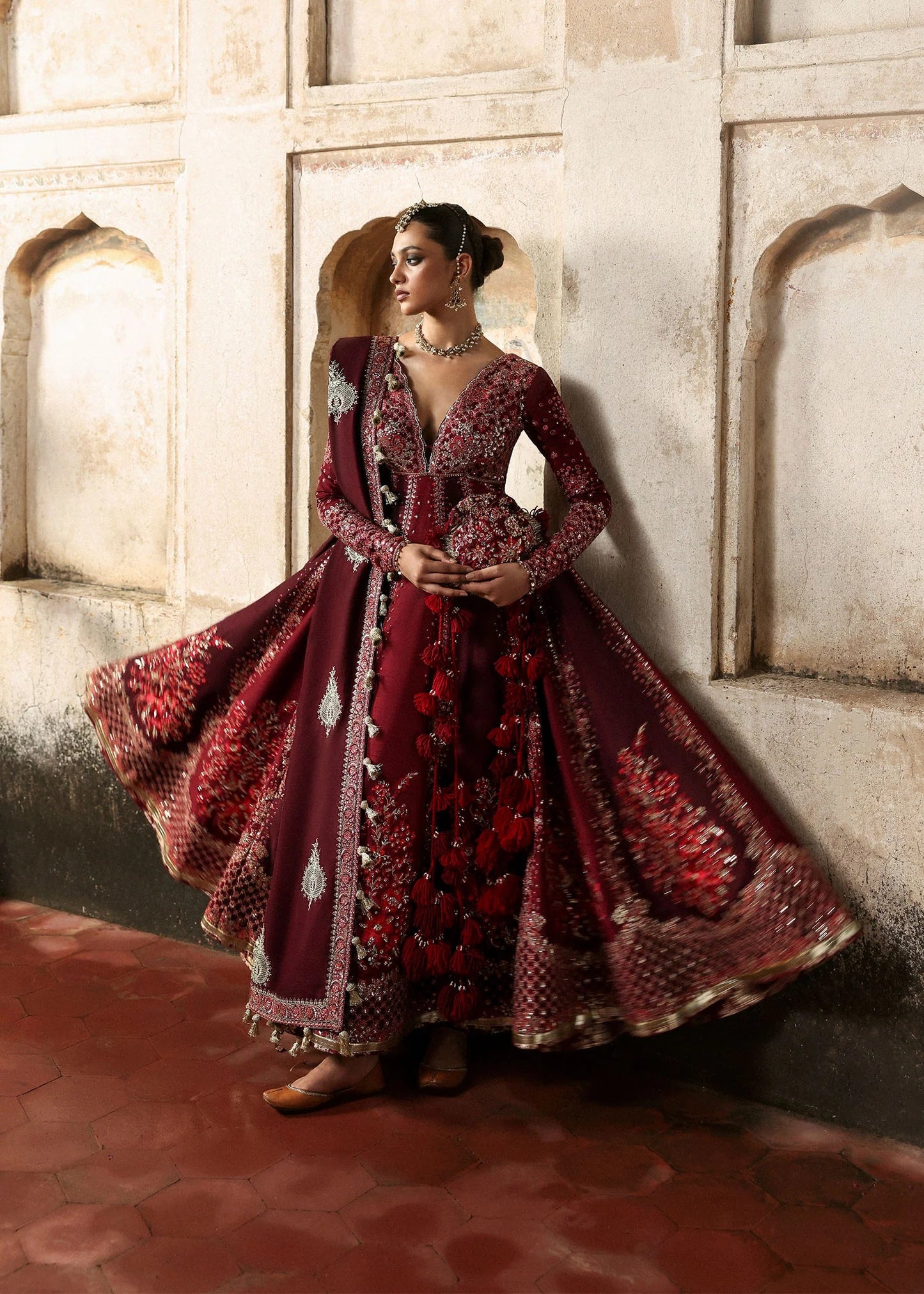 Elegant burgundy and maroon Korean raw silk pishwas with rich embroidery and matching churidar. Unstitched luxury outfit for timeless royal grace.