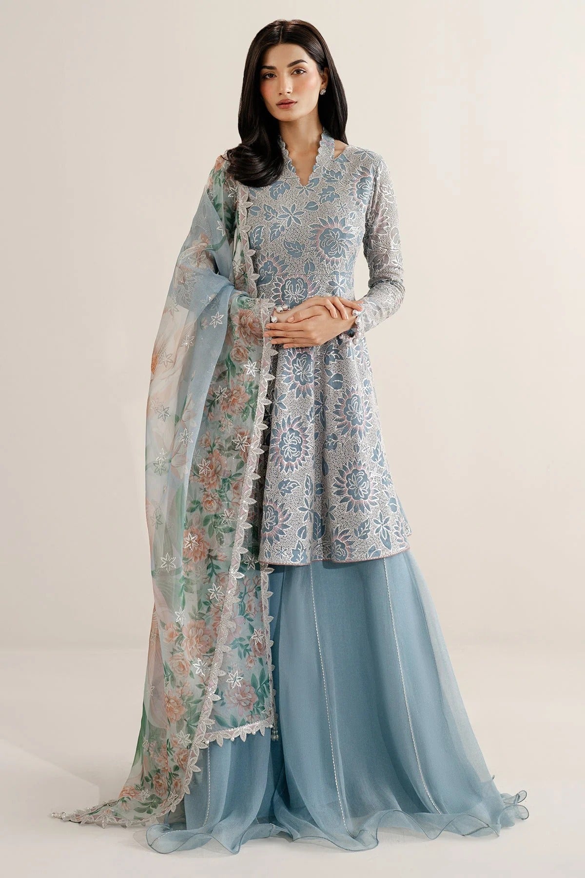 Featuring embroidered chiffon, organza dupatta, and rawsilk bottom, UC-3075 blends tradition and style—perfect for formal events and festive wear.