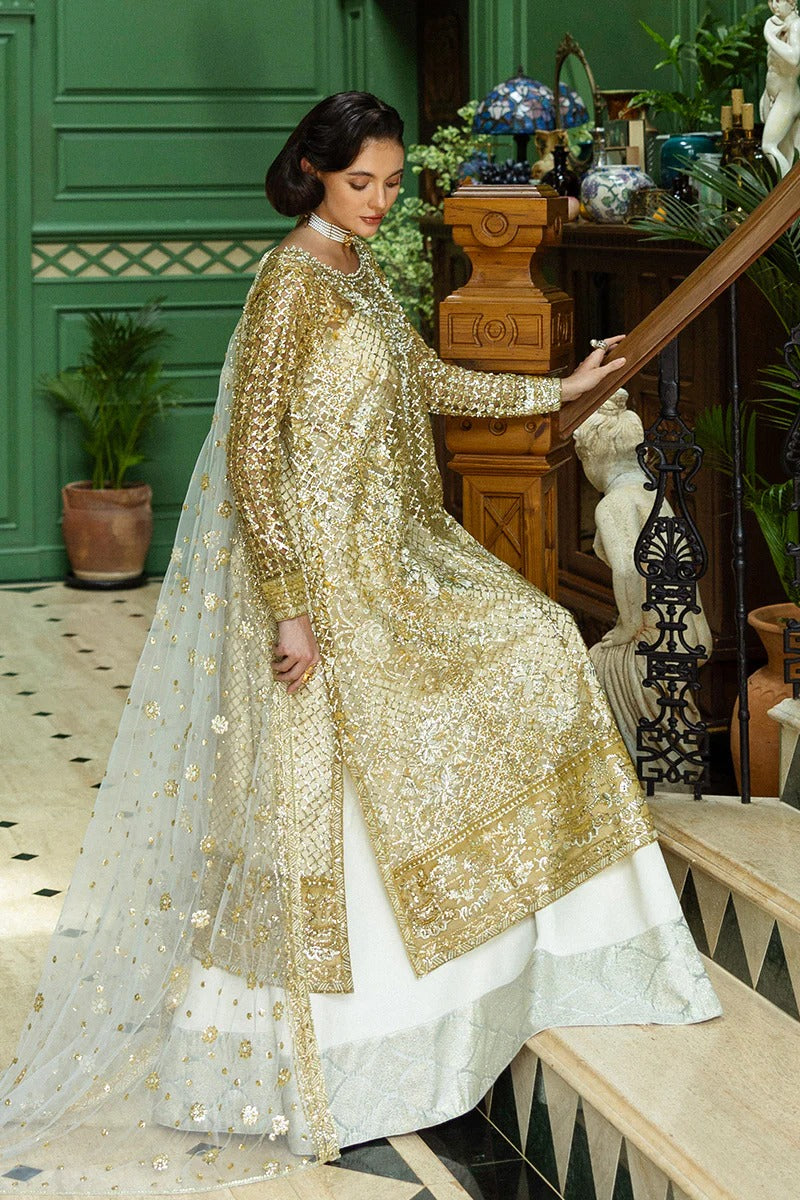 Elegant white & gold dress with embroidered net shirt, sequined dupatta, raw silk trouser, jamawar finishing, and hand-embellished neckline.