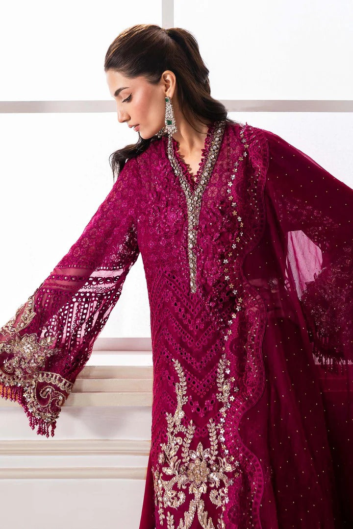 Elegant chiffon suit with 3D floral embellishments, hand embroidery, and organza dupatta. Includes raw silk undershirt and trouser. Color may slightly vary.