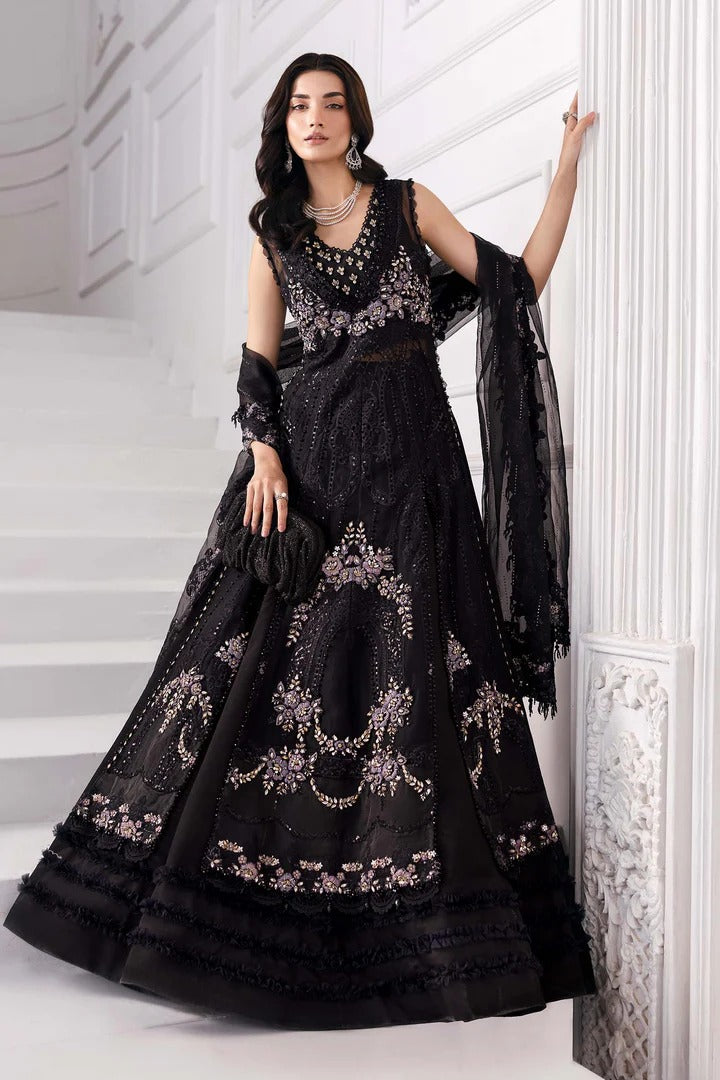 Elegant organza suit with 3D floral hand embellishments, embroidered panels, and diamante dupatta. Includes raw silk trouser & undershirt. Shop now.