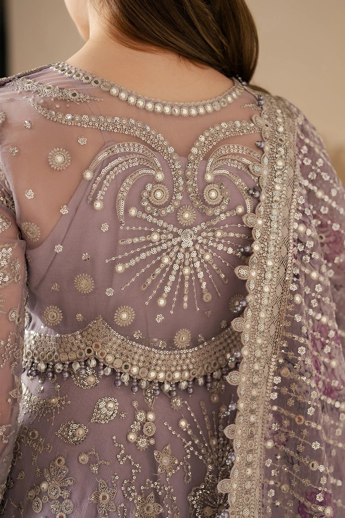 Elevate your style with this embroidered chiffon outfit featuring digital prints, luxe borders & rawsilk inner—perfect for any event. Shop WF'25-05 now!