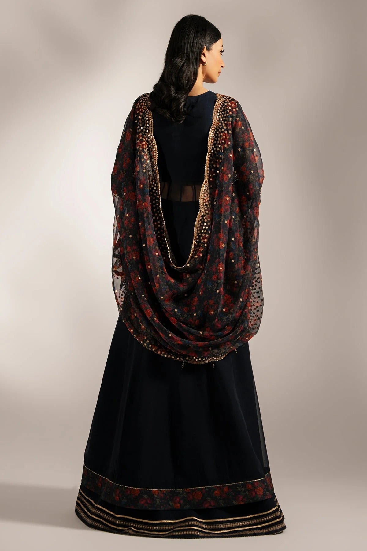Intricately embroidered chiffon with digital print dupatta & rawsilk bottom—perfect for formal occasions. A luxurious look in every detail. Shop UC-3073 now!