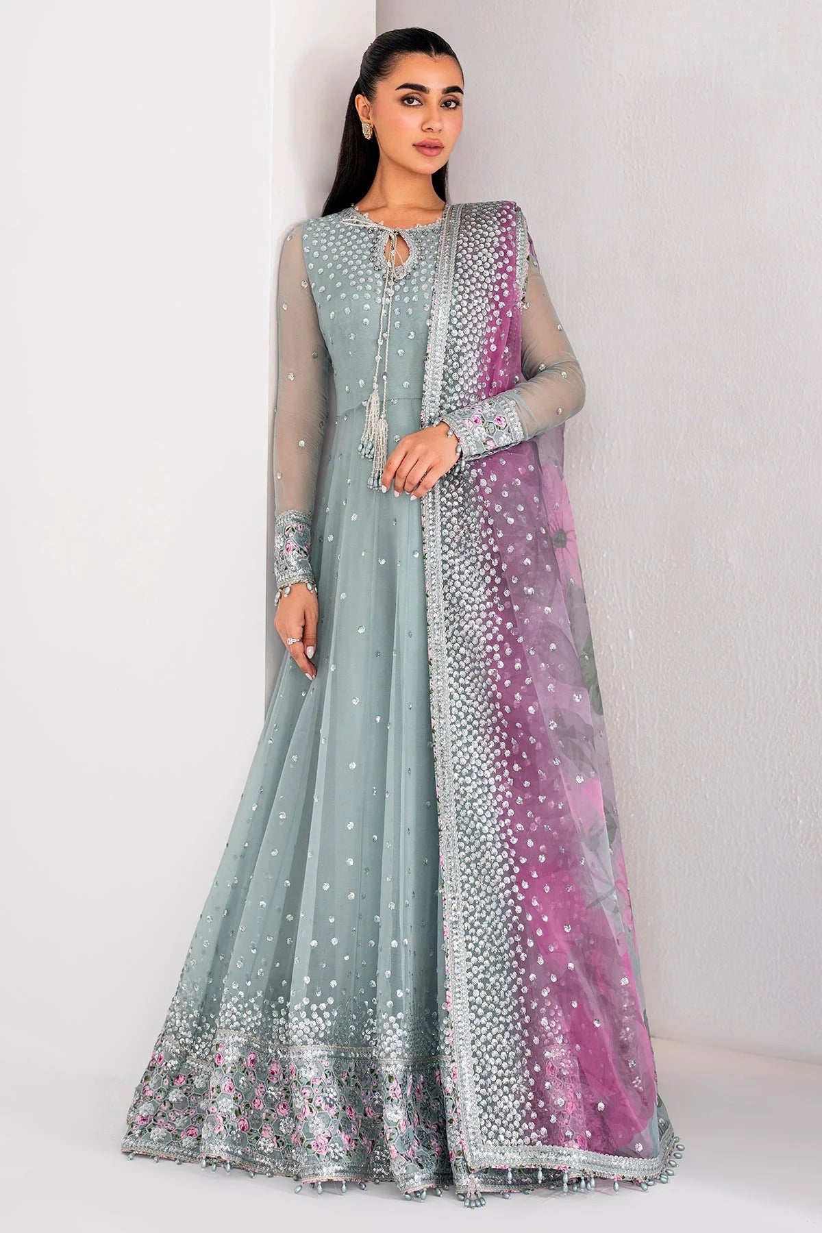 UC-3062 blends embroidered chiffon with digital prints, organza dupatta, and rawsilk trouser—crafted for elegance and perfect for formal occasions.