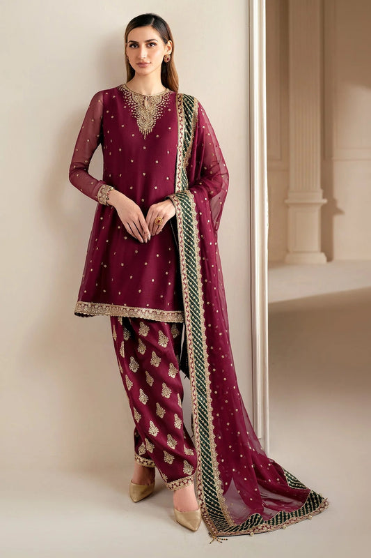 UC-3068 features delicate embroidery on chiffon panels, sleeves, and dupatta—paired with a rawsilk bottom and dyed border. Perfect for formal occasions.