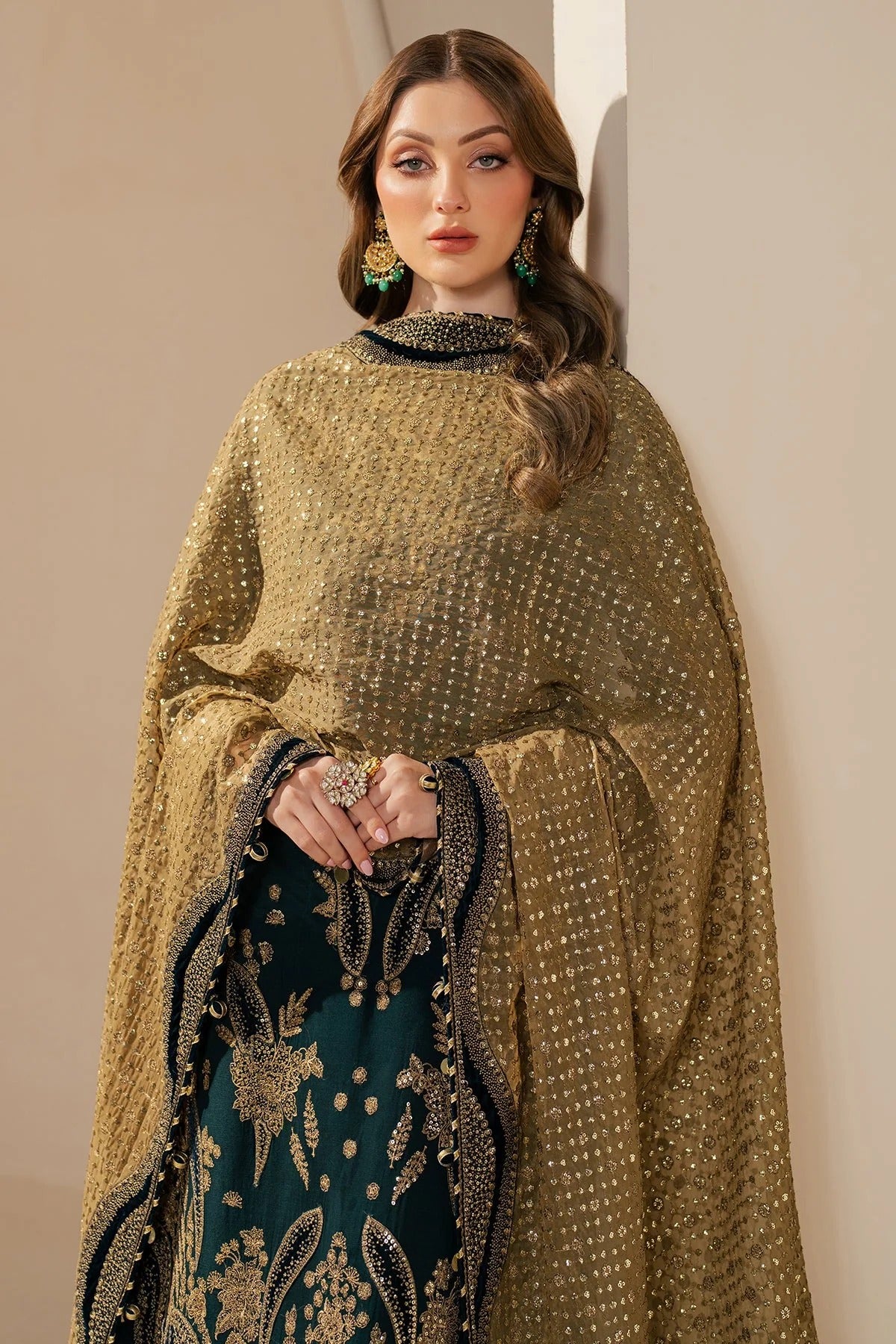 WF'25-06 blends chiffon embroidery with velvet appliqué on front, back, and sleeves—paired with organza dupatta and rawsilk bottom for a luxe finish.