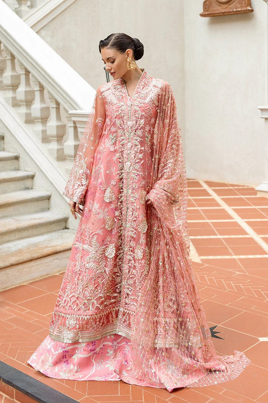 Elegant coral dress with embroidered net shirt, sequined dupatta, raw silk trouser, 3D bird embellishments, and handmade tassels for luxury style.