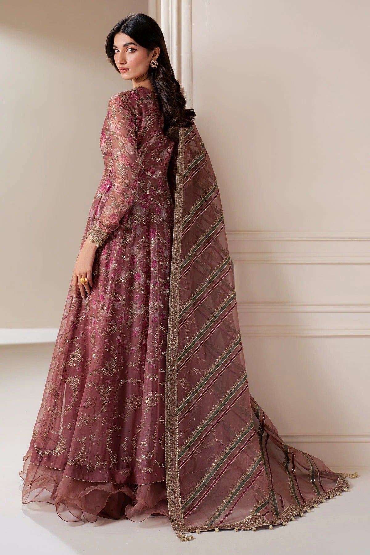 UC-3064 features embroidered chiffon panels and yoke, organza dupatta, and rawsilk bottom—perfect for graceful, high-end festive and formal occasions.