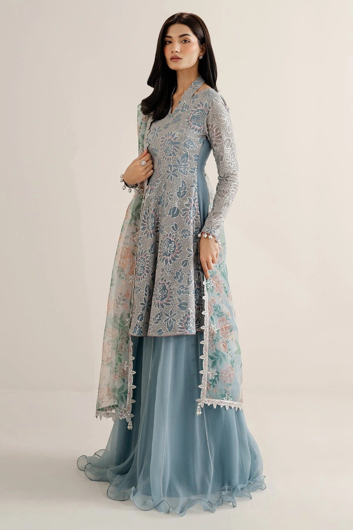 Featuring embroidered chiffon, organza dupatta, and rawsilk bottom, UC-3075 blends tradition and style—perfect for formal events and festive wear.