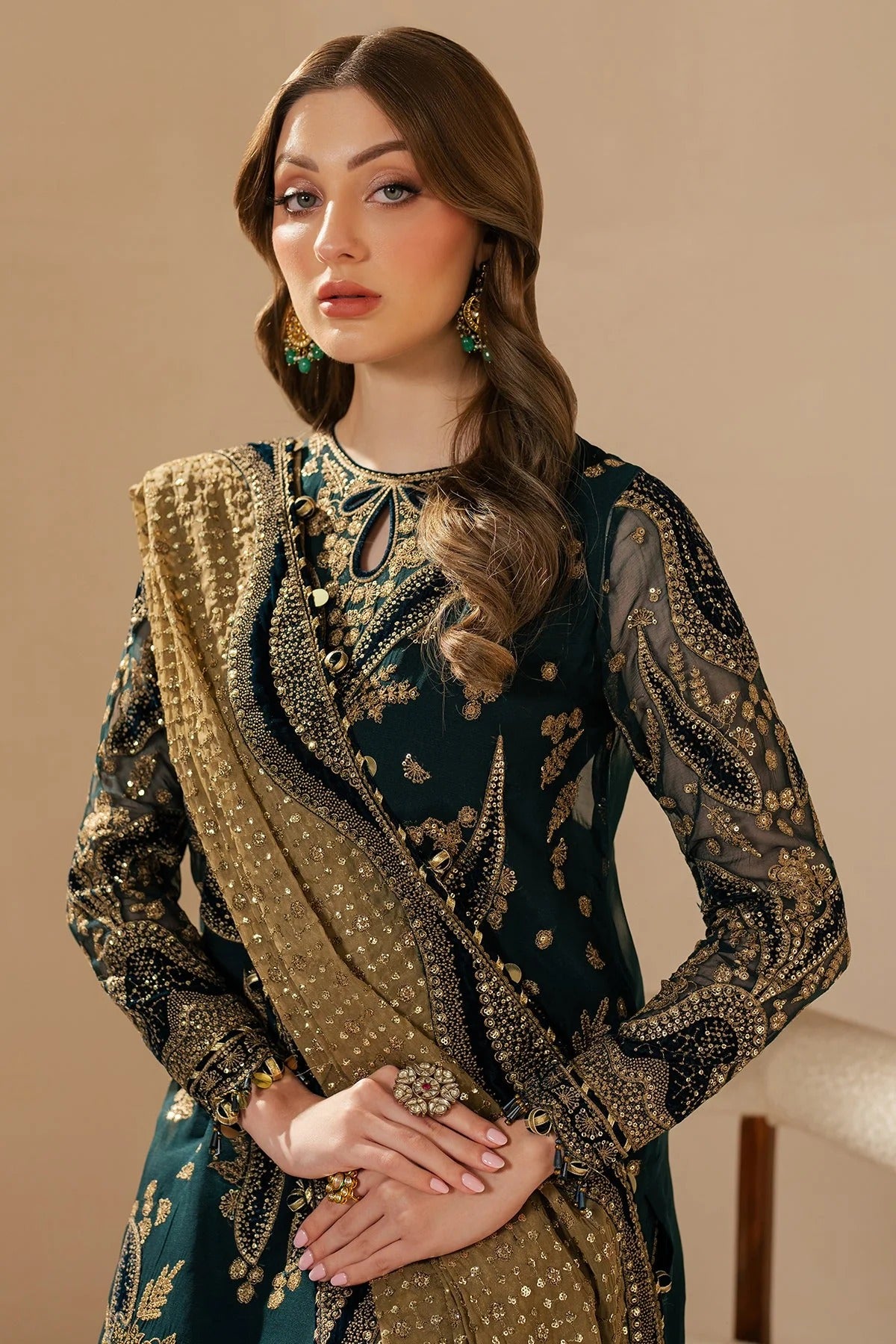 WF'25-06 blends chiffon embroidery with velvet appliqué on front, back, and sleeves—paired with organza dupatta and rawsilk bottom for a luxe finish.