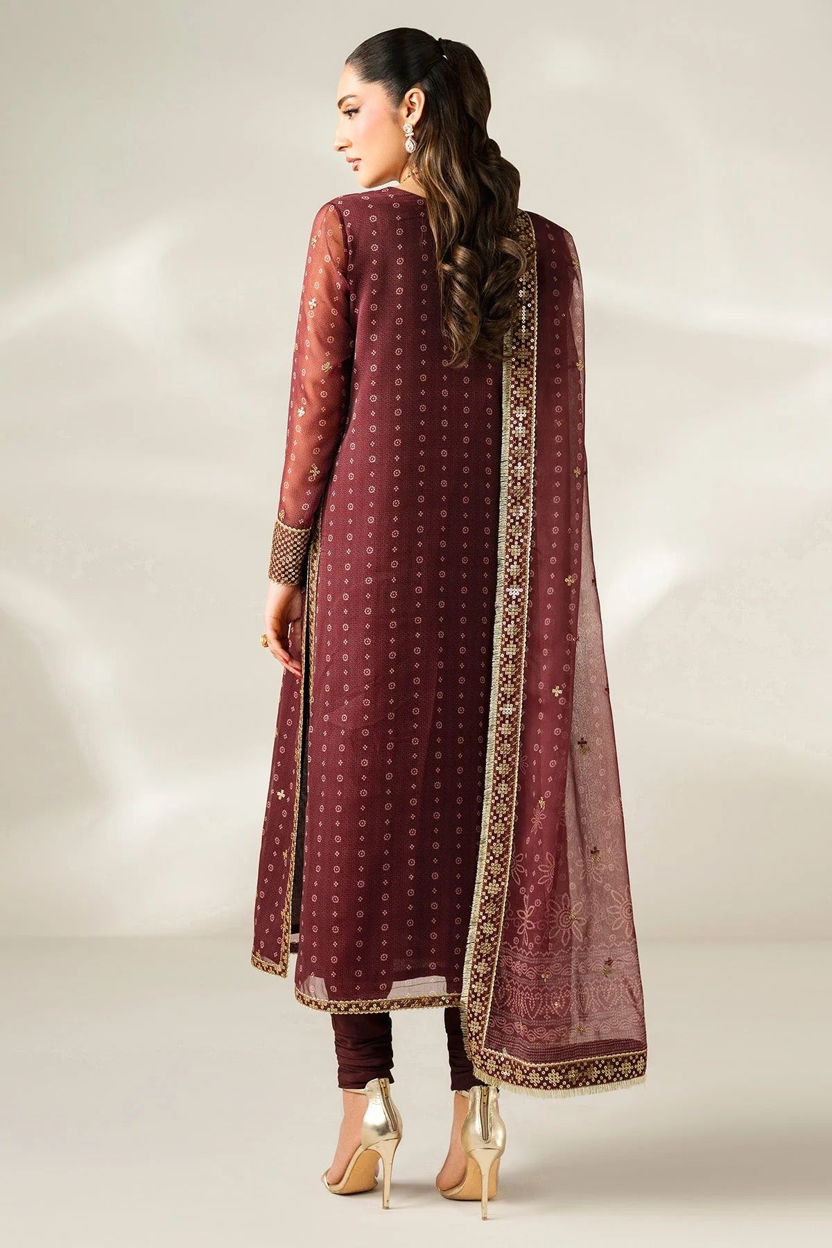 Digitally printed chiffon with intricate embroidery, bordered dupatta, and dyed raw silk bottom—perfect for weddings, festive events, or formal wear.