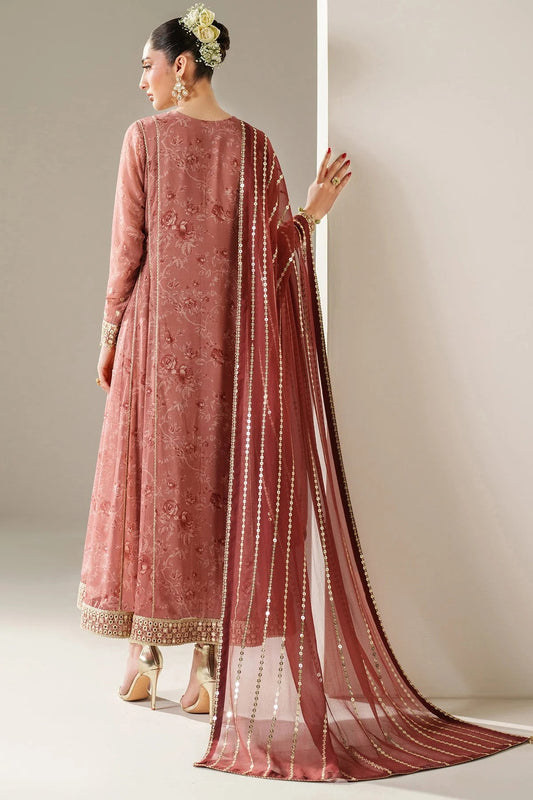 Digitally printed chiffon suit with embroidered borders & dupatta. Features rawsilk bottom for a rich, elegant look. Perfect for formal & festive wear.