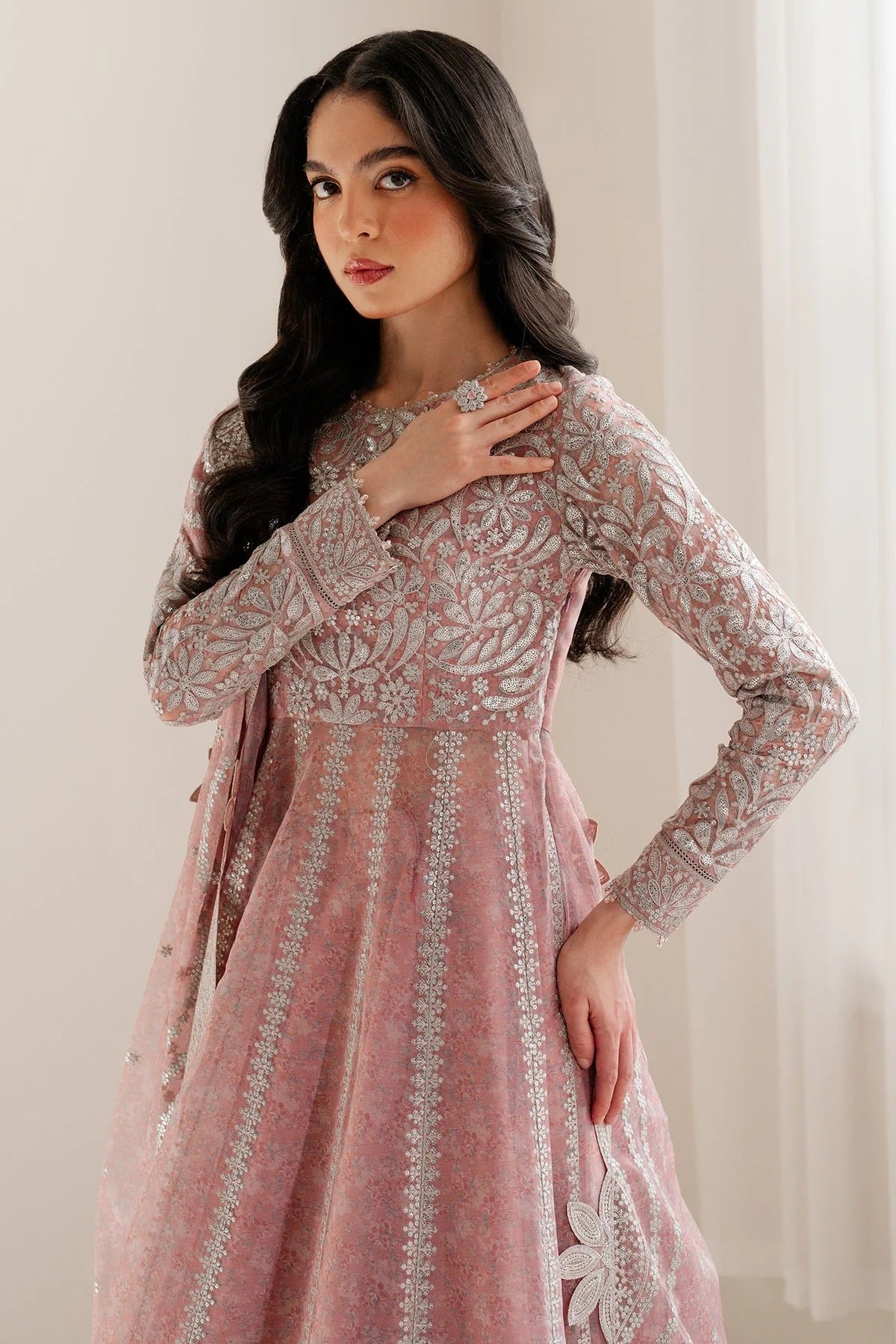 Upgrade your wardrobe with UC-3079 — a digitally printed, embroidered chiffon suit with rawsilk bottom. A perfect blend of elegance and style. Shop now!