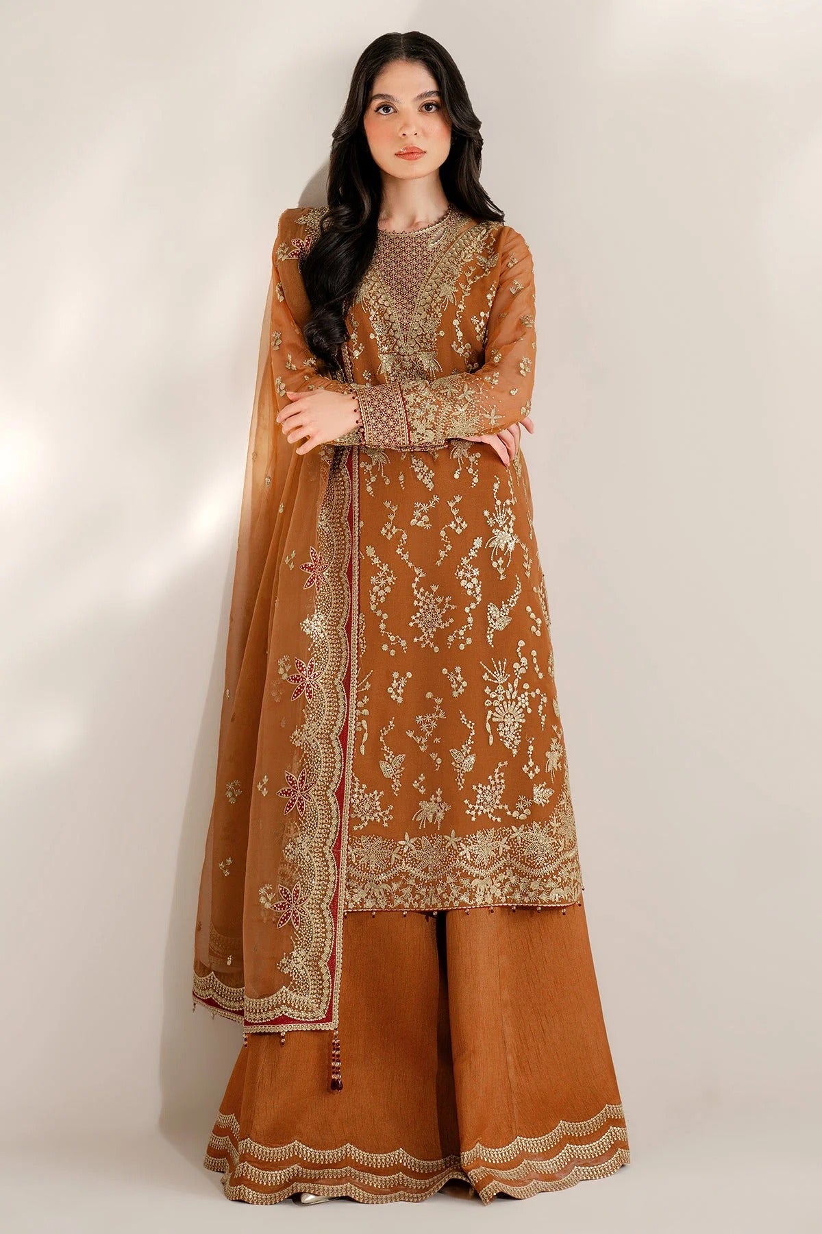 Chiffon and rawsilk elegance with intricate embroidery and organza dupatta. Ideal for formal wear and events. Make a bold style statement in UC-3077.