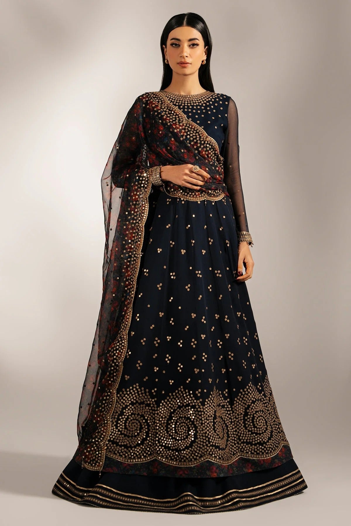 Intricately embroidered chiffon with digital print dupatta & rawsilk bottom—perfect for formal occasions. A luxurious look in every detail. Shop UC-3073 now!