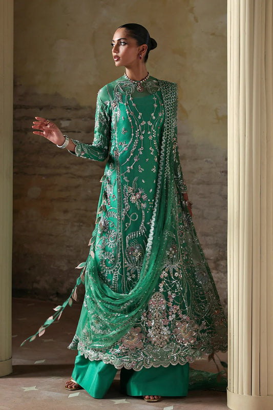 Shop this elegant Mazari Green unstitched suit with embroidered organza panels, hand embellishments, 3D floral details, silk trouser & net dupatta.