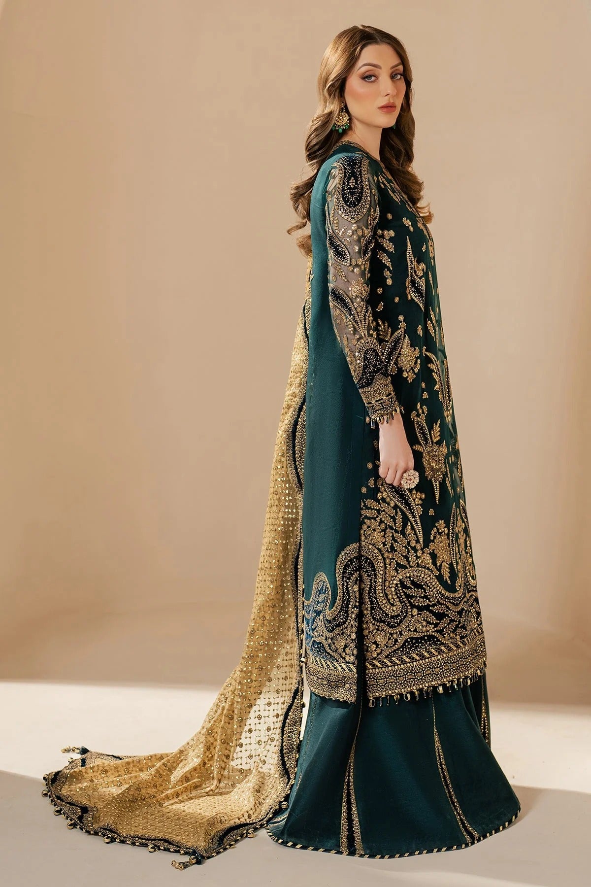 WF'25-06 blends chiffon embroidery with velvet appliqué on front, back, and sleeves—paired with organza dupatta and rawsilk bottom for a luxe finish.