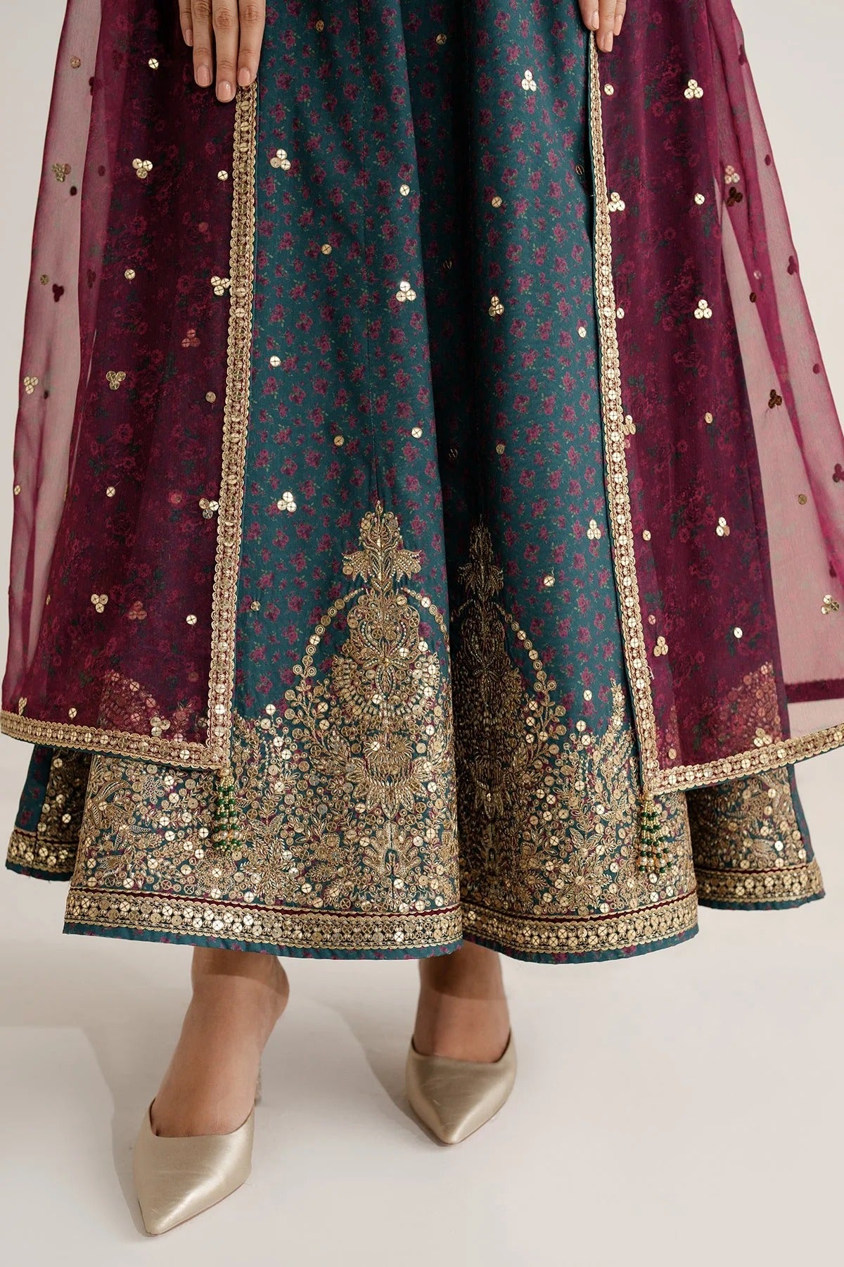 Discover UR-7058: a premium embroidered raw silk suit with chiffon dupatta and elegant borders. Perfect for formal, festive, or party occasions. Shop now!
