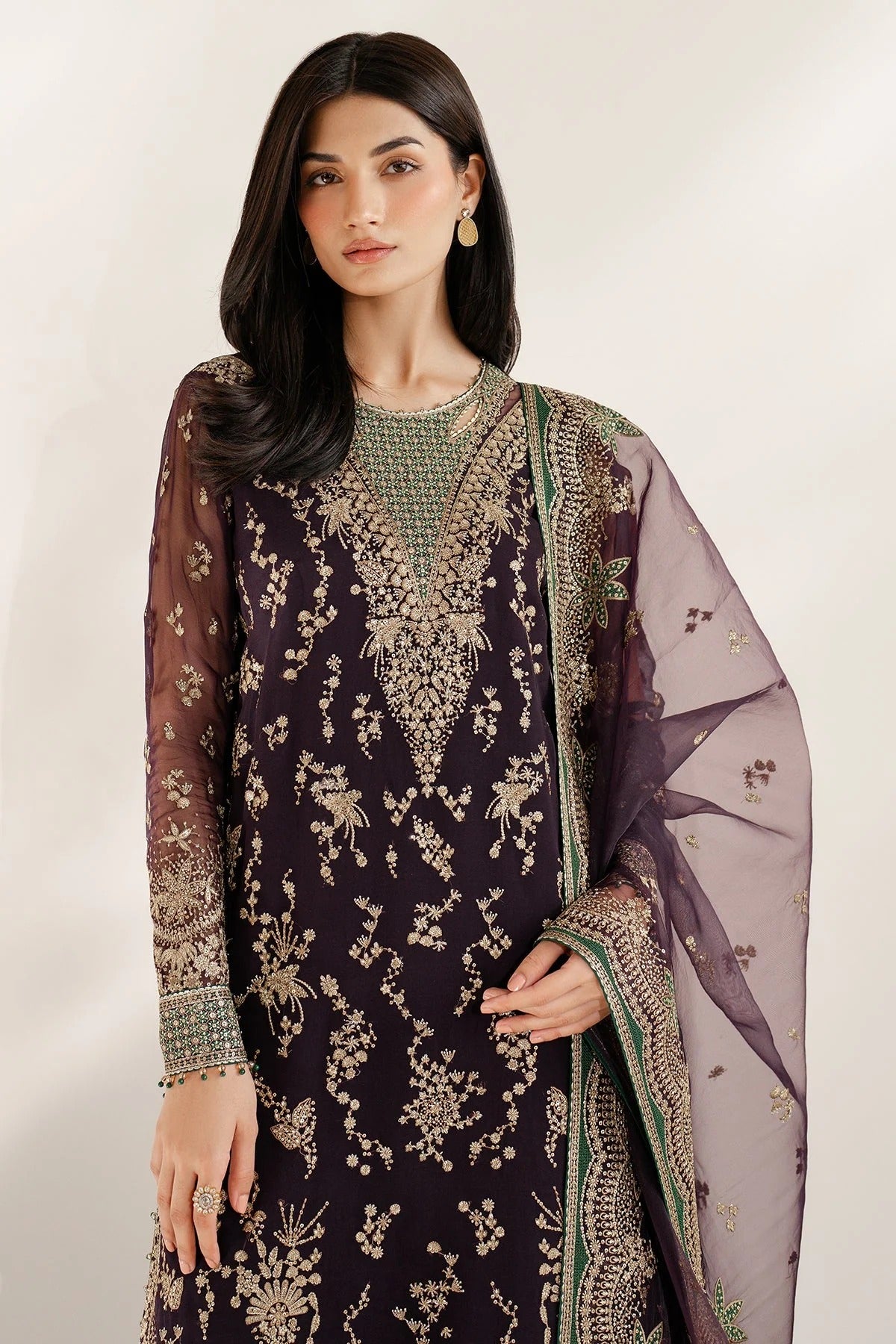 UC-3078 features intricate embroidery, organza dupatta, and rawsilk bottom—crafted for timeless elegance. Perfect for festive, party, or formal occasions.