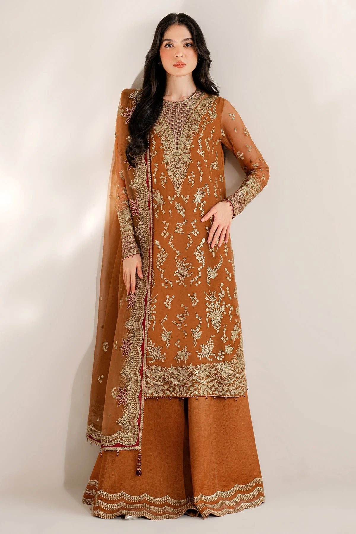 Chiffon and rawsilk elegance with intricate embroidery and organza dupatta. Ideal for formal wear and events. Make a bold style statement in UC-3077.