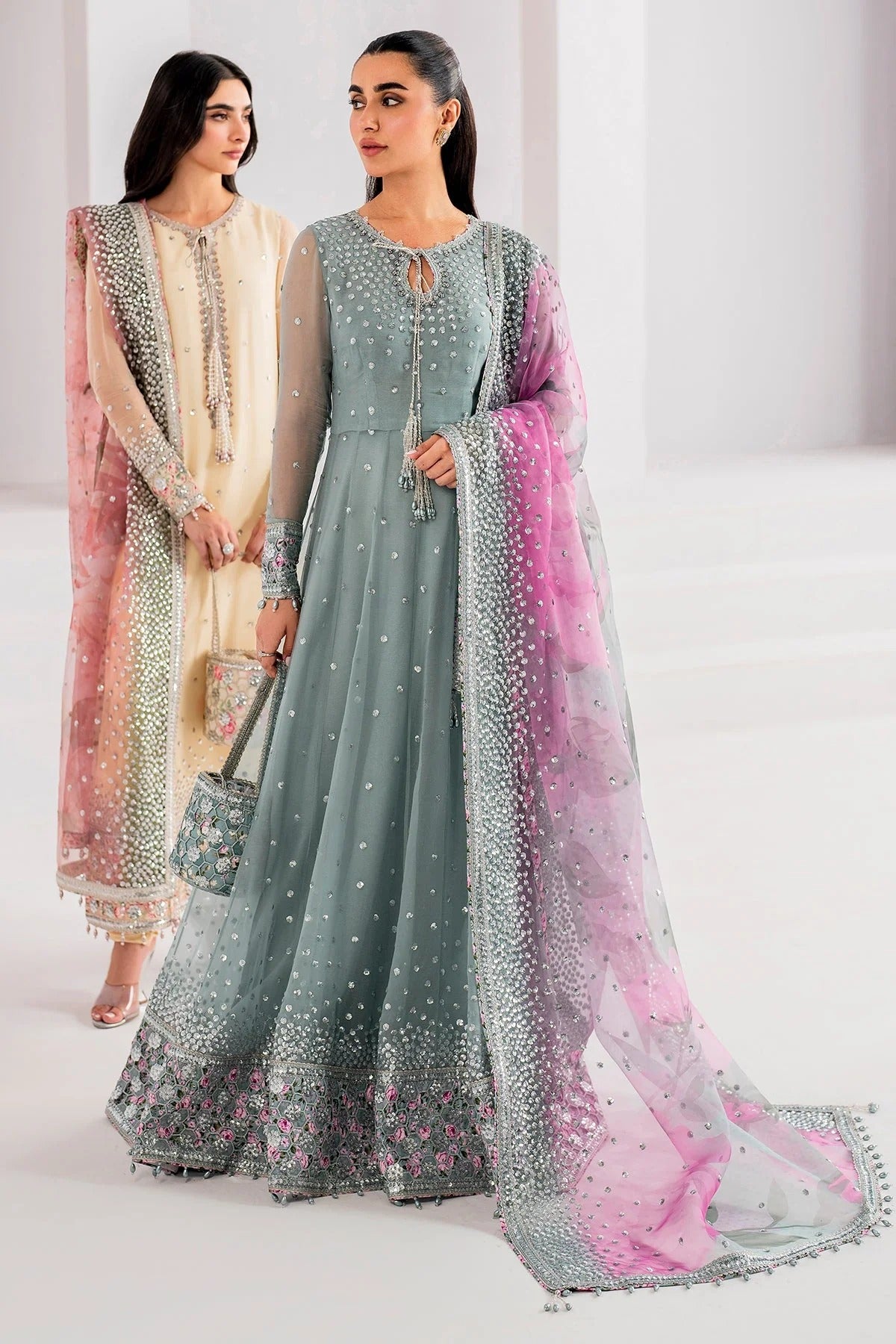 UC-3062 blends embroidered chiffon with digital prints, organza dupatta, and rawsilk trouser—crafted for elegance and perfect for formal occasions.