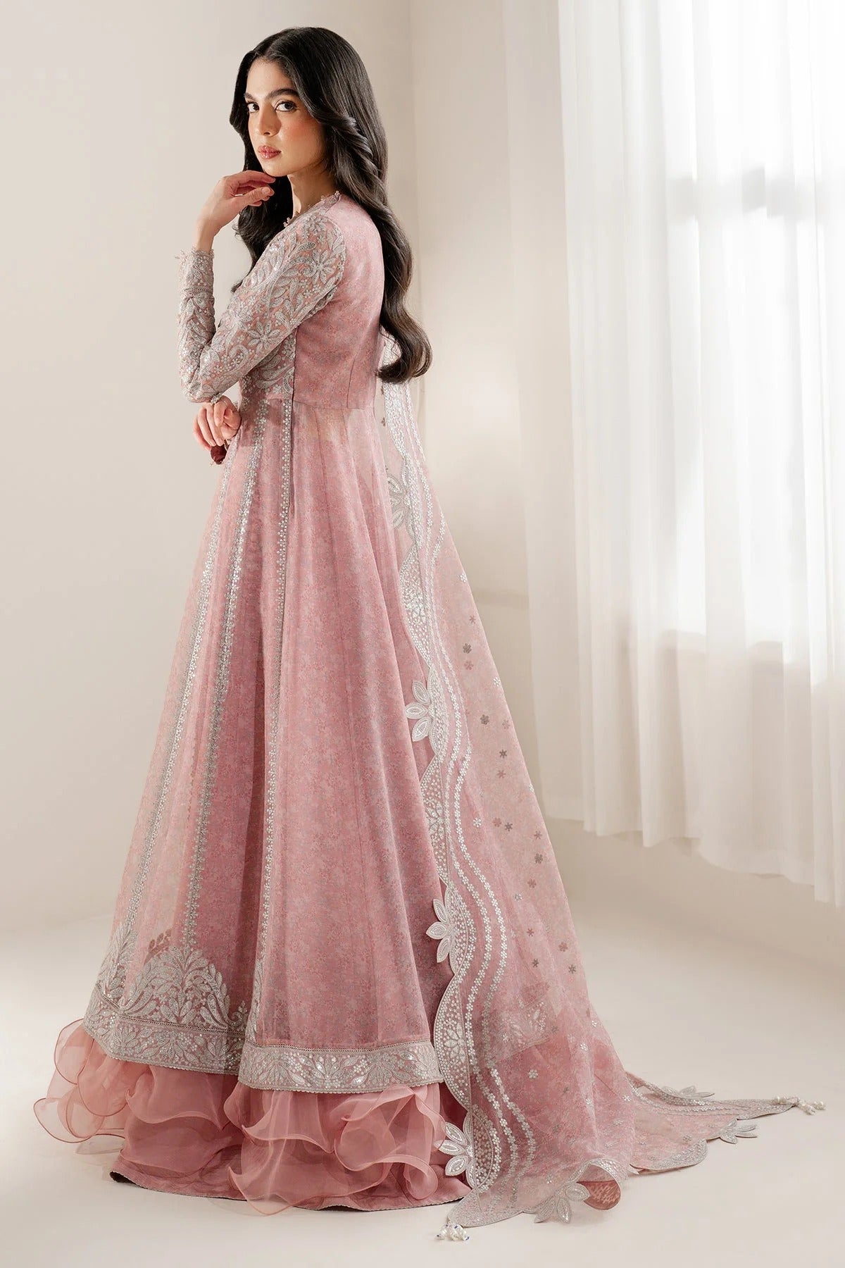 Upgrade your wardrobe with UC-3079 — a digitally printed, embroidered chiffon suit with rawsilk bottom. A perfect blend of elegance and style. Shop now!
