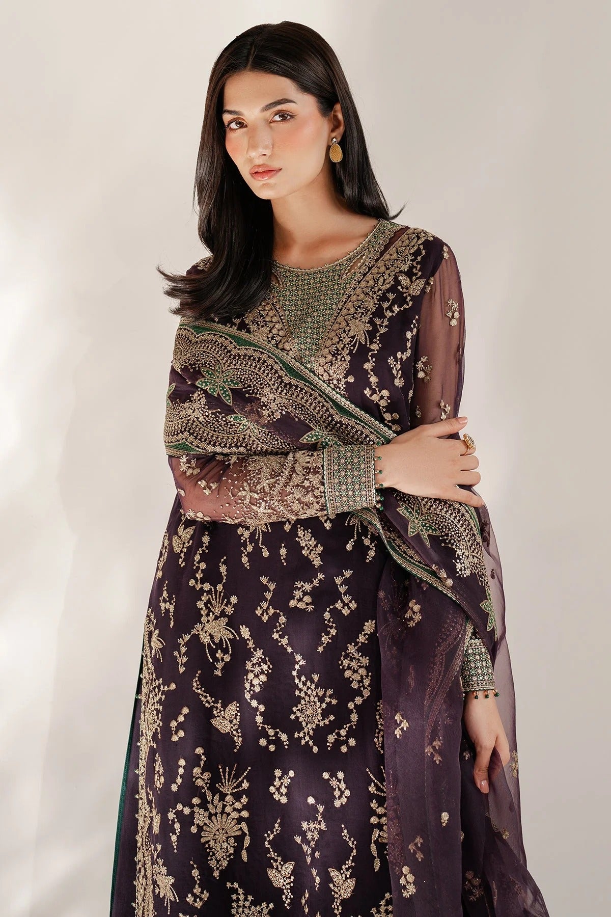 UC-3078 features intricate embroidery, organza dupatta, and rawsilk bottom—crafted for timeless elegance. Perfect for festive, party, or formal occasions.