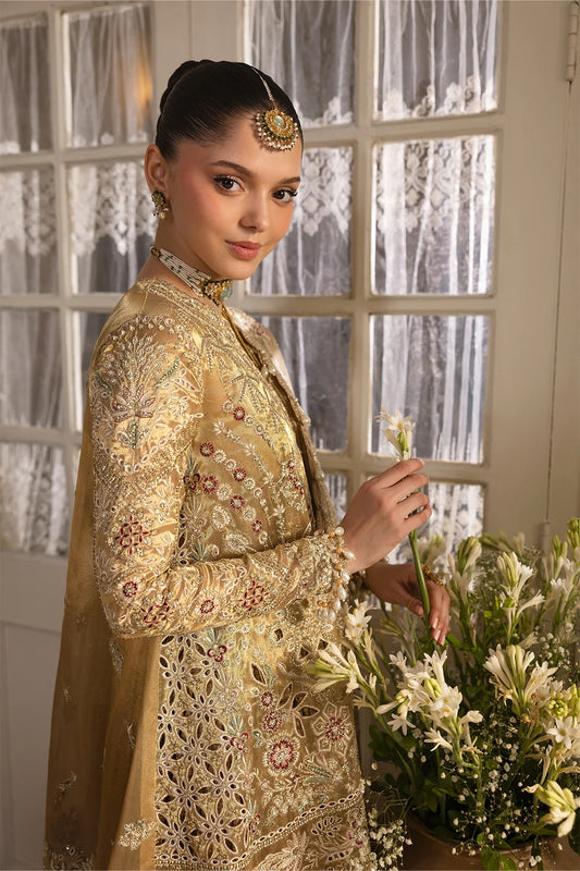 Opulent golden tissue outfit with intricate zari embroidery, dupatta, and jamavaar trousers. Ideal for weddings, formal events, or festive occasions.