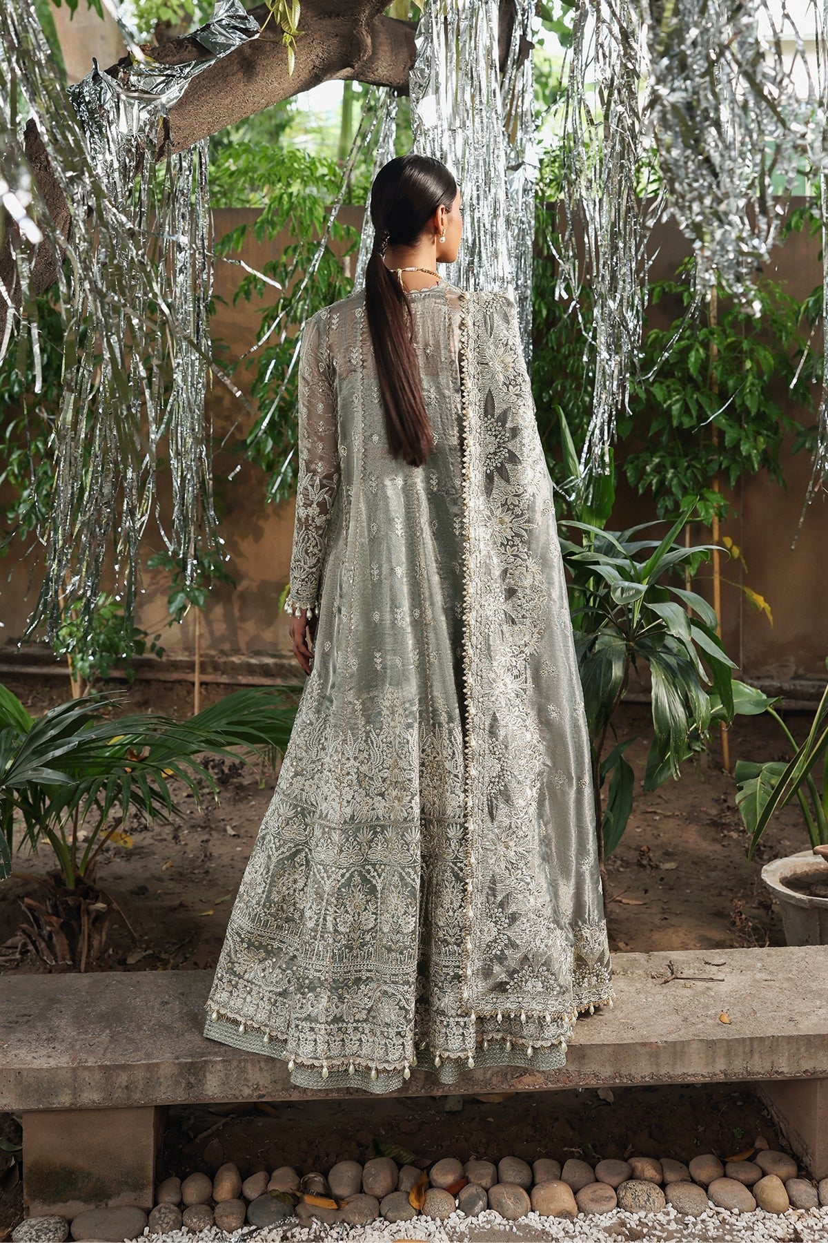 Refined dusty grey viscose outfit with zari embroidery, open front border, dupatta, and raw silk trouser. Perfect for formal and festive occasions.